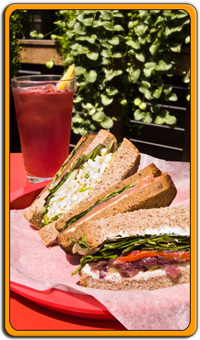 sandwiches and ice tea outside on the deck